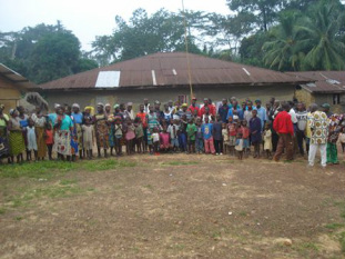 Array of Zeor Village residents after a community meeting
